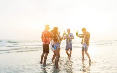 Friends laughing on the beach in Cancun
